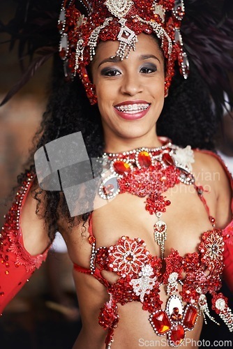 Image of Dancer, carnival and girl in portrait with smile, pride or culture with glow for street performance in night. Person, fashion and woman at event, party or celebration with tradition in Rio de Janeiro