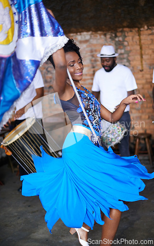 Image of Show, drums or festival with a happy woman or dancer dancing in a carnival in Rio de Janeiro, Brazil. Performance, party or rhythm with musician, performer or artist banging to create beat in band