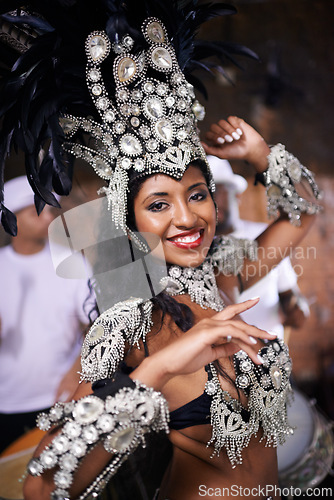 Image of Culture, portrait and woman at carnival with costume for celebration, music and happy dance performance in Brazil. Samba, party and girl at festival, parade or show in Rio de Janeiro with smile.