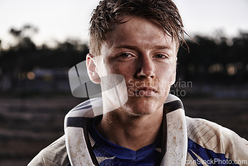 Image of Sports, dirt bike and portrait of man on offroad in gear for race, challenge or competition. Serious, adventure and face of male athlete motorcyclist with mud at action motorcross rally outdoor.