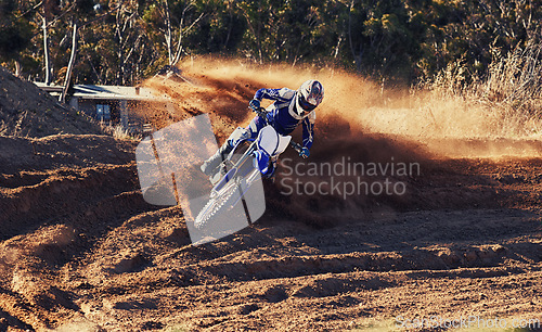 Image of Person, dirt racer and professional motorcyclist on bike for extreme sports competition on outdoor track. Expert rider on motorbike or scrambler for sand course, challenge or off road rally in nature