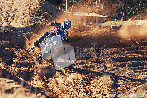 Image of Person, motorbike and professional motorcyclist in extreme sports for competition on outdoor track. Expert rider on dirt bike or driving for sand course, challenge or off road rally track in nature