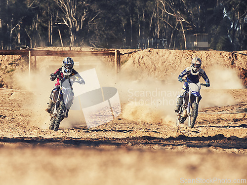 Image of Sport, racer and motorbike in action for competition on dirt road with performance, challenge and adventure. Motocross, motorcycle and dirtbike driver with helmet on offroad course or path for racing