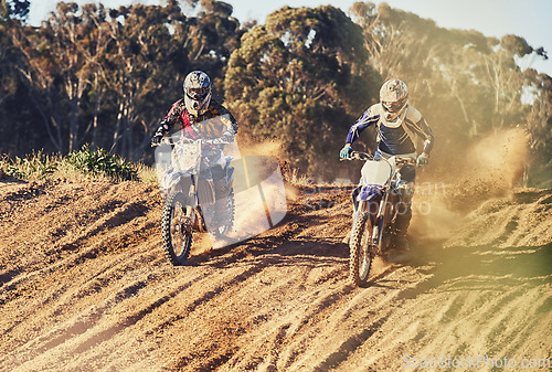Image of Sport, racer and motorcycle in action for challenge on dirt road with performance, competition and adventure. Motocross, motorbike or dirtbike driver with helmet on offroad course and dust in racing