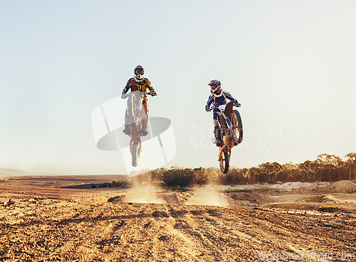 Image of Sport, racer and motorcycle in action for competition on dirt road with performance, challenge or adventure. Professional, motorbike or dirtbike driver with stunt on offroad course or path for racing