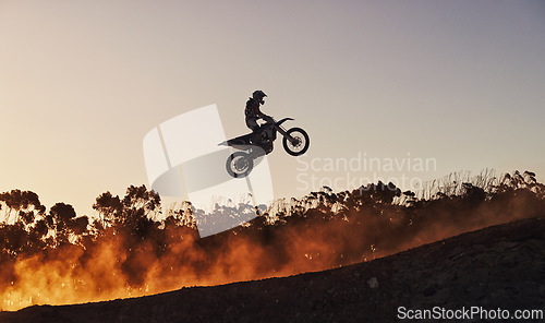 Image of Person, jump and professional motorcyclist in the air on mockup for trick, stunt or ramp on outdoor dirt track. Expert rider on motorbike with lift off for extreme sports or rally challenge in nature