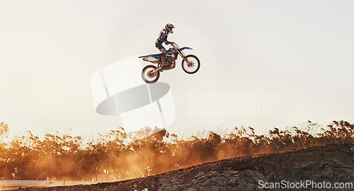 Image of Person, jump and professional motorcyclist on mockup in the air for trick, stunt or ramp on outdoor dirt track. Expert rider on motorbike with lift off for extreme sports or rally challenge in nature