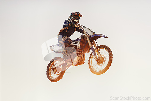 Image of Person, jump and motorcyclist in the air for extreme sports, trick or outdoor stunt in sunset on mockup. Expert rider on motorbike or lift off for rally challenge, performance or adrenaline in nature