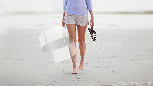 Image of Legs, walking and beach relax for vacation for holiday weekend or tropical island, summer or wellness. Person, barefoot and sand at Florida ocean for explore adventure or peaceful, resting or calm