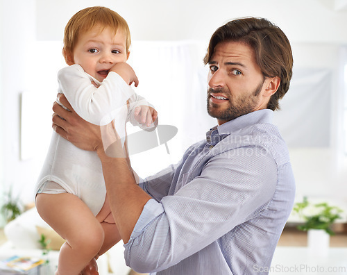 Image of Baby boy, father and portrait with disgusted face, foul smell and dirty diaper to change. Male toddler, dad and people at home, living room or house for parenthood, child development and hygiene