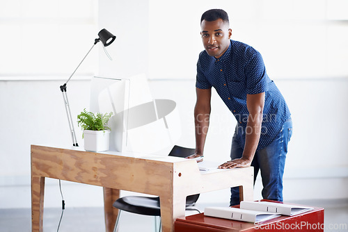 Image of Man, portrait and writing notes at desk, employee and ideas in journal for inspiration in creative business. Black male person, notepad and planning for startup company, accountant and info in office