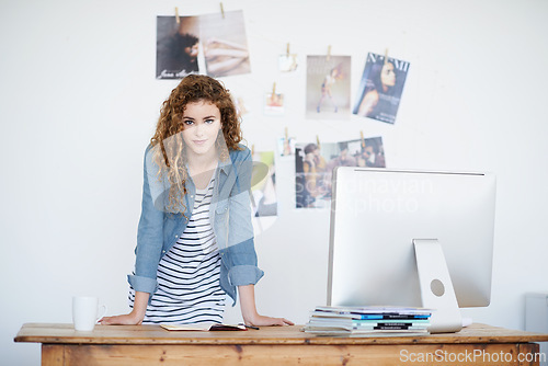 Image of Business, woman and portrait at creative desk and office for planning of startup project or online magazine. Portrait of young worker and visual editor or graphic designer of website or social media