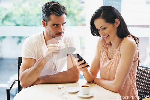 Image of Couple, cafe and woman with cellphone texting or annoyed partner for internet distraction, social media or ignore. Man, wife and coffee shop or espresso date in Italy or online chat, unhappy or upset