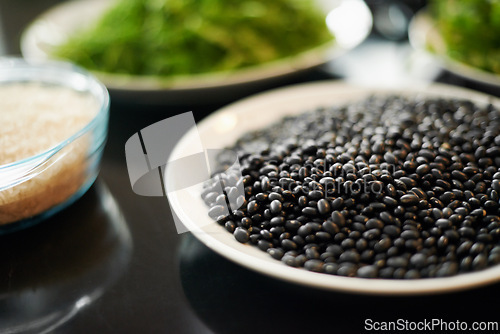 Image of Black beans, food and lunch with closeup of Mediterranean cooking, vegan and nutrition for diet. Health, green and dish at a restaurant or diner with organic, salad and appetizer for Mexican dinner