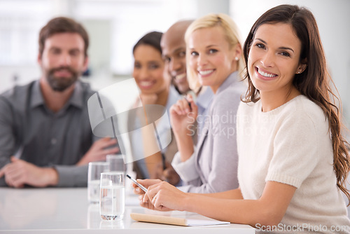 Image of Professional female person, smile and meeting for brainstorm, diary and notes for account project in office. Business woman, employees and notebook for company, portrait and conference room with idea