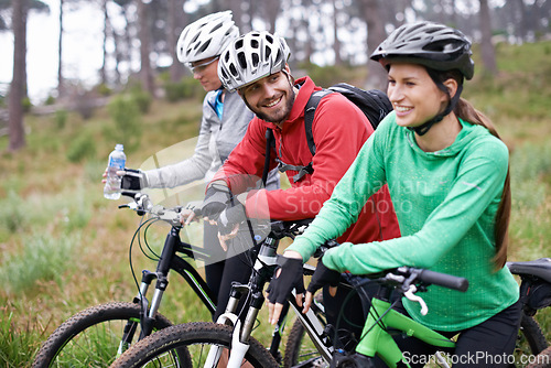 Image of Friends, cyclist and fitness on bike with for adventure, exercise and health with bonding in Chicago. Happy, trail and mountain with hobby for mindset in nature, trip and wellness for fun.