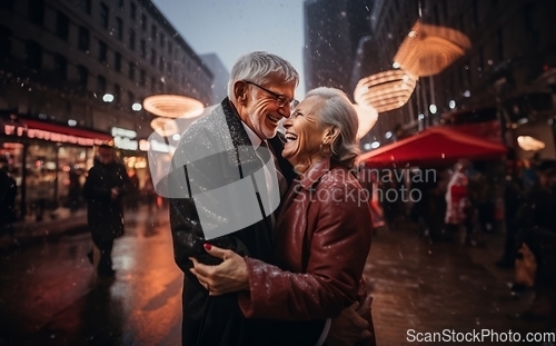 Image of In the serene snowfall, an elderly couple shares a heartfelt embrace, enveloped in the warm glow of love on a wintry night