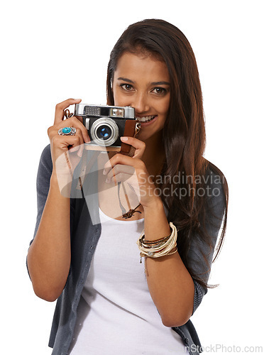 Image of Portrait, camera and happy woman in studio for creative photoshoot, memory or capture on white background. Lens, career and face of student journalist with equipment for paparazzi, news or reporting