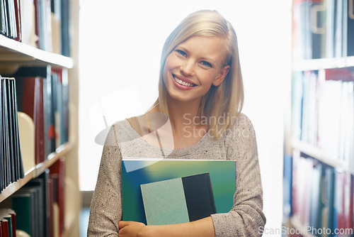 Image of Woman, library and book, portrait with story for education and knowledge with smile on campus. Student, bookstore and reading material for learning, happy with university and academic development