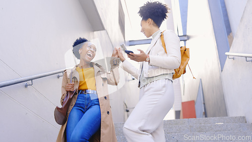 Image of Happy, high five and friends with phone outdoor on stairs in city with celebration of success or achievement. Excited, women and support for announcement of college news, information or notification