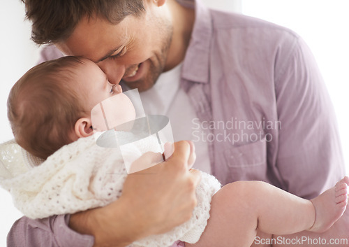 Image of Baby, girl and dad holding with smile, proud and fathers day in family home. Parents, infant and love embrace for eskimo kiss, growth and healthy child development in nursery for affection parenting