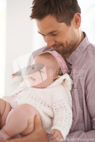 Image of Family, baby and dad in home with love, support and youth with parent and bonding. Relax, father and happy in a house with hug of calm infant with childcare and smile with a girl in living room