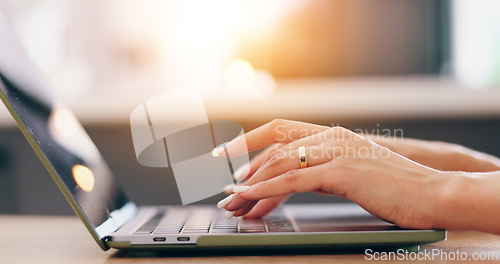 Image of Hands, laptop and woman with typing in closeup for remote work from home for online media company. Person, employee or freelance writer with computer, keyboard and click for articles, blog or story