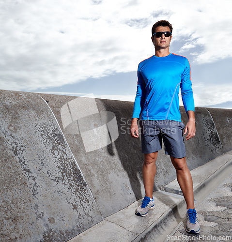 Image of Man, promenade and ready for run outdoors, fitness and athlete for performance training. Male person, full body and sunglasses for workout on weekend, outside and prepare for exercise challenge