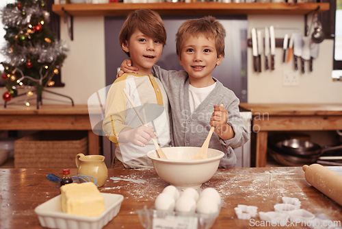 Image of Portrait, hug and brothers in a kitchen, baking and smile with happiness and ingredients. Face, kids and siblings with Christmas holiday and weekend break with hobby, home and child development