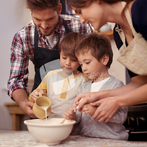 Image of Children, parents or baking in kitchen with ingredients, home or learning of dessert cake with love. Happy family, teaching or bowl for cookies on table, care or bonding together on holiday in house