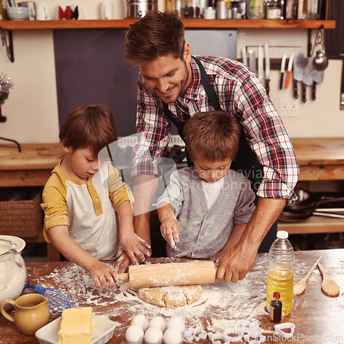 Image of Father, smile and kids baking, learning and happy boys bonding together in home. Dad, children and cooking with flour, rolling pin and teaching brothers with family at table in kitchen for pasty cake