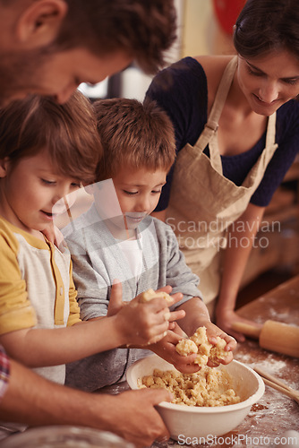 Image of Happy family, learning and baking in kitchen with cookie dough, home and support for cake with love. Parents, teaching and kids for biscuits on table, care and bonding together on vacation in house