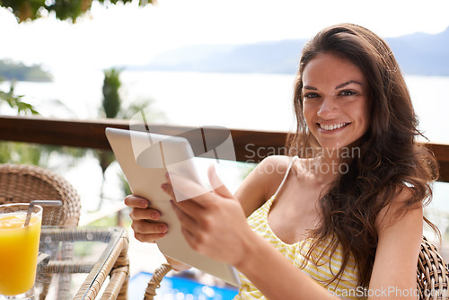 Image of Woman, portrait and vacation in Bali with tablet, breakfast and swimsuit on holiday while at resort. Female person, smile and exotic island background on patio, getaway and summer for relaxation