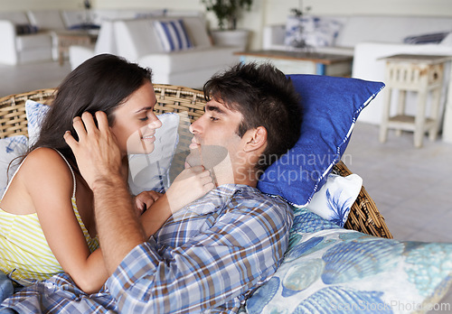 Image of Couple, relax and romantic vacation for bonding, relationship and spouse comfort for security. Man, woman and together in living room to cuddle, commitment and summer holiday for happiness and safety