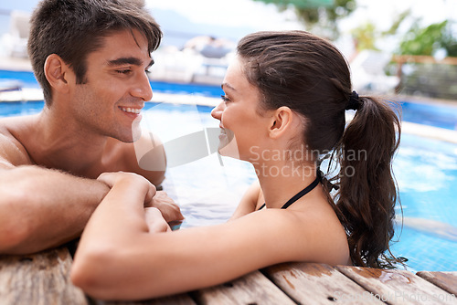 Image of Couple, jacuzzi and smile for bonding on holiday with love, date and summer to relax outdoor. Relationship, vacation and happy in outdoor with pool for affection, romance and support together.