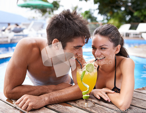 Image of Swimming pool, cocktail and couple with holiday, sunshine and weekend break with happiness, relax and honeymoon. Summer, man or woman with tropical drink or wet with getaway trip or luxury with water