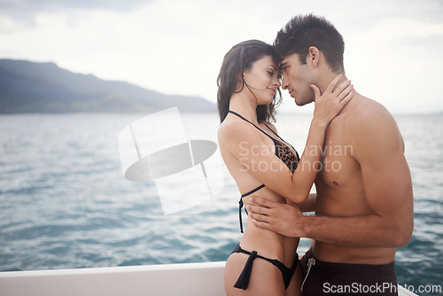 Image of Love, couple and touch forehead at sea for vacation, holiday or travel together on boat in summer. Man, woman and intimate at ocean for connection, care or adventure by water outdoor on mockup space