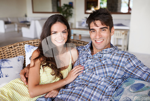 Image of Couple, portrait and romantic vacation for love, relationship and spouse comfort for security. Man, woman and together in living room for bonding, commitment and summer holiday to relax and happiness
