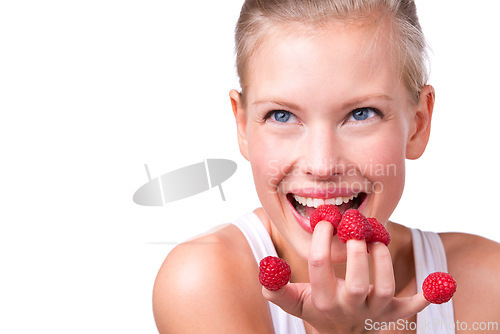 Image of Healthy, playful and woman eating raspberries, fingers and wellness isolated on white studio background. Person, mockup space or model with fruit and funny with nutrition, fresh or happiness with joy