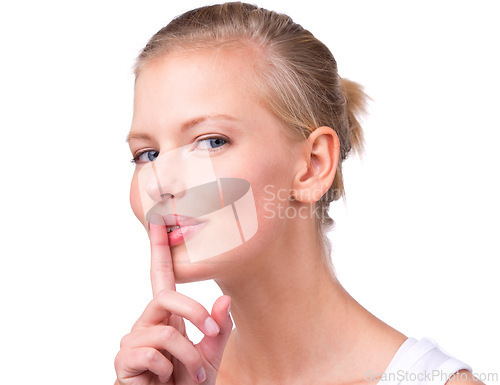 Image of Woman, portrait and finger with secret in studio for noise, privacy and whisper for confidential mystery. Model, person and face with shush gesture for silence, gossip or surprise on white background