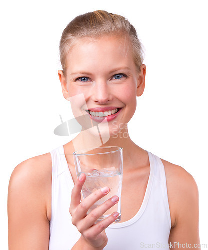 Image of Portrait, woman and health with water glass, smile and happy on white background. Young female, nutrition and wellness goals in studio for hydrate, refresh and thirst for detox and happiness