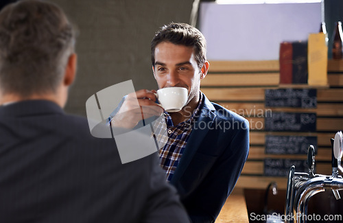 Image of People, drink and coffee in pub for business meeting, appointment or consultation in Dublin. Businessmen, smile and hot beverage for discussion, team building or conversation after work at restaurant