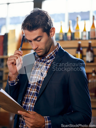 Image of Restaurant, thinking or man with stock, checklist for small business logistics, inventory or menu on clipboard. Startup, pub ideas or manager with sale price for retail order in diner cafe or bar