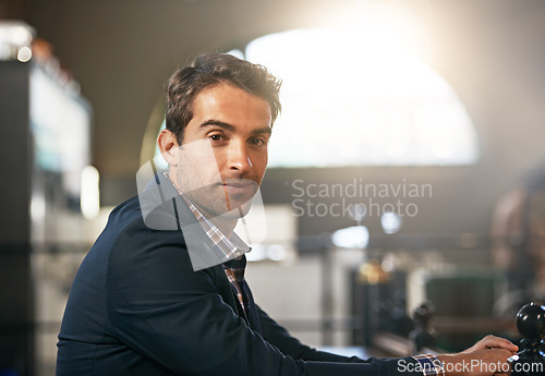 Image of Professional, businessman and portrait at table in office as meeting, convention and event planner for hotels. Male person, entrepreneur and creative career for profession, job and client service