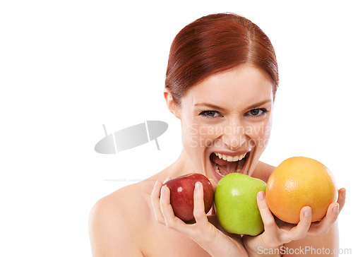 Image of Woman, portrait and bite fruit in studio or healthy food for lose weight on white background, vegetarian or wellness. Female person, face and apple snack for fibre meal eating, vitamin c or mockup