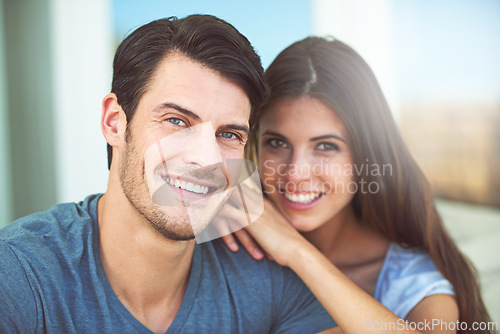 Image of Happy, love and portrait of couple on sofa relaxing and bonding together in living room at home. Smile, romance and young man and woman with positive attitude resting in lounge at apartment.