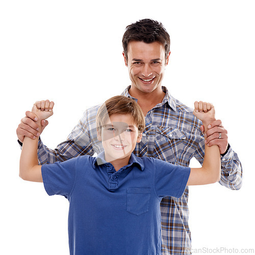 Image of Family, muscle and portrait of father with boy on a white background for bonding, happy and love. Smile, parenthood and face of dad flex with son for support, care and playing together in studio