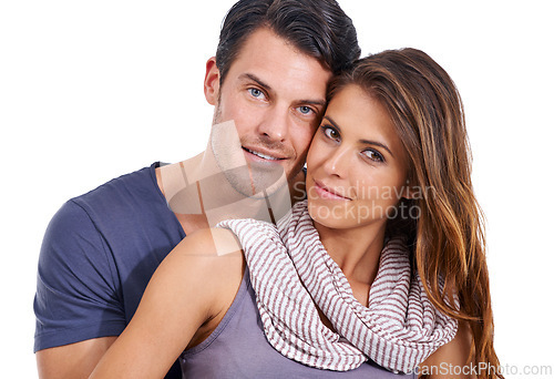 Image of Couple, hug and portrait in studio with love for romance, bonding or honeymoon date with affection. Marriage, man and woman with embrace, care or smile for anniversary commitment on white background