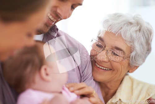 Image of Family, grandmother with baby and parents for happiness at home, people bonding with love and relationship. Support, trust and care with old woman meeting young child, smile for pride and generations