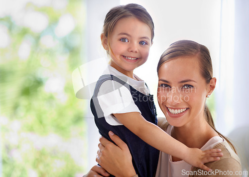 Image of Mom, kid and hug for love in portrait, happy for security with bonding and care at family home. Safety, trust and affection with embrace to nurture and people with joy and comfort for connection